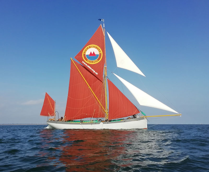 sea change blue mermaid sailing barge