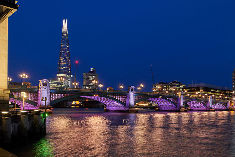 illuminated river southwark bridge