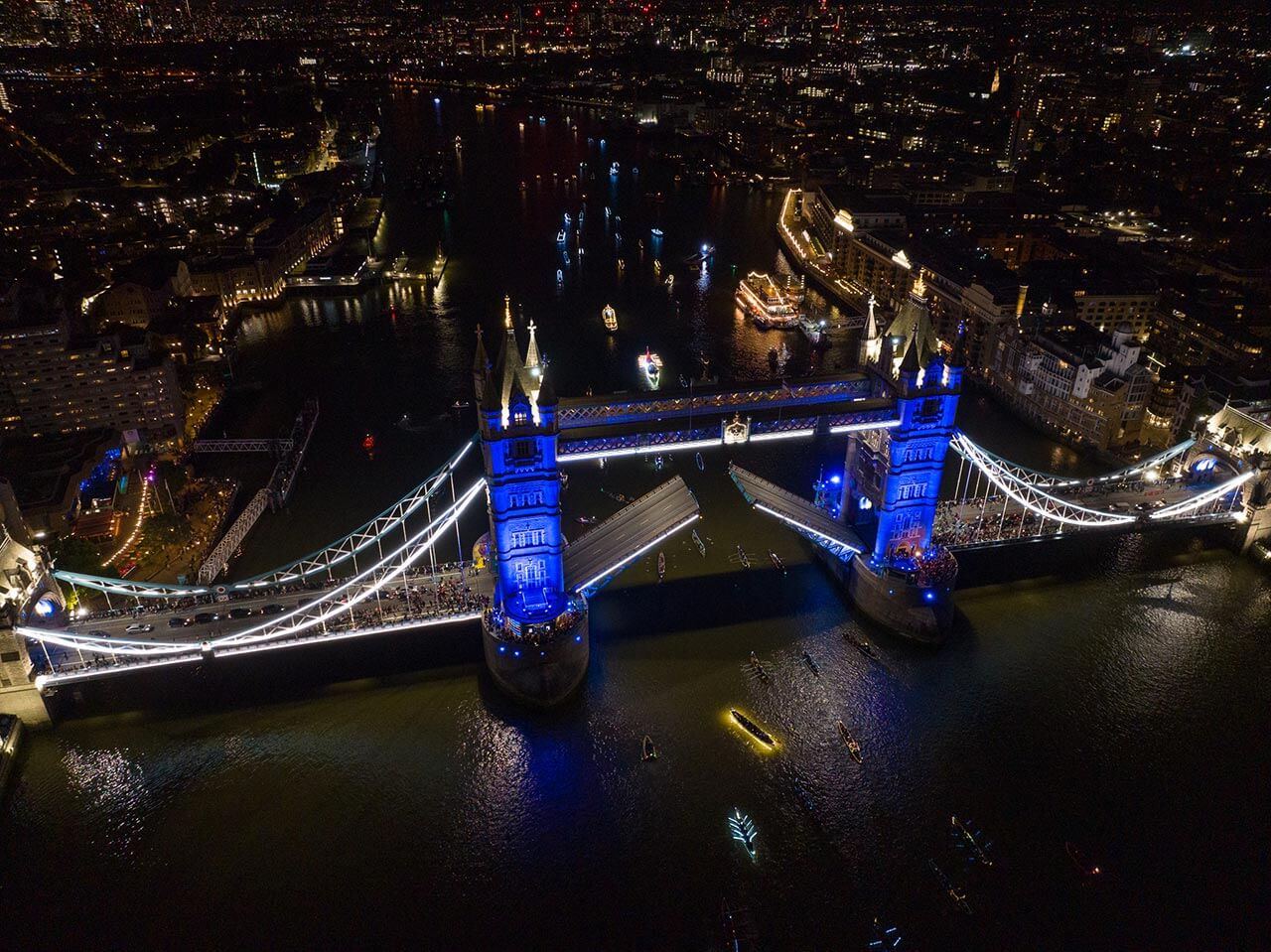 reflections flotilla river thames tower bridge
