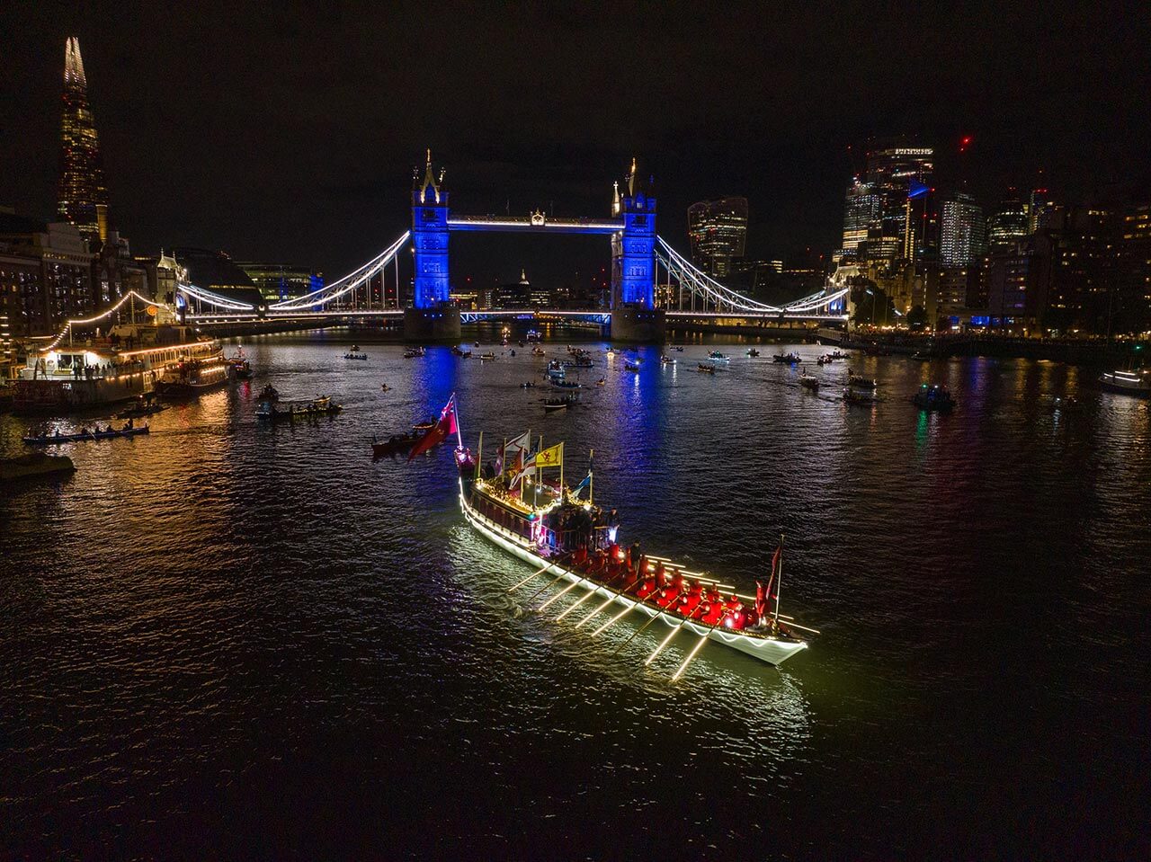 reflections flotilla river thames tower bridge
