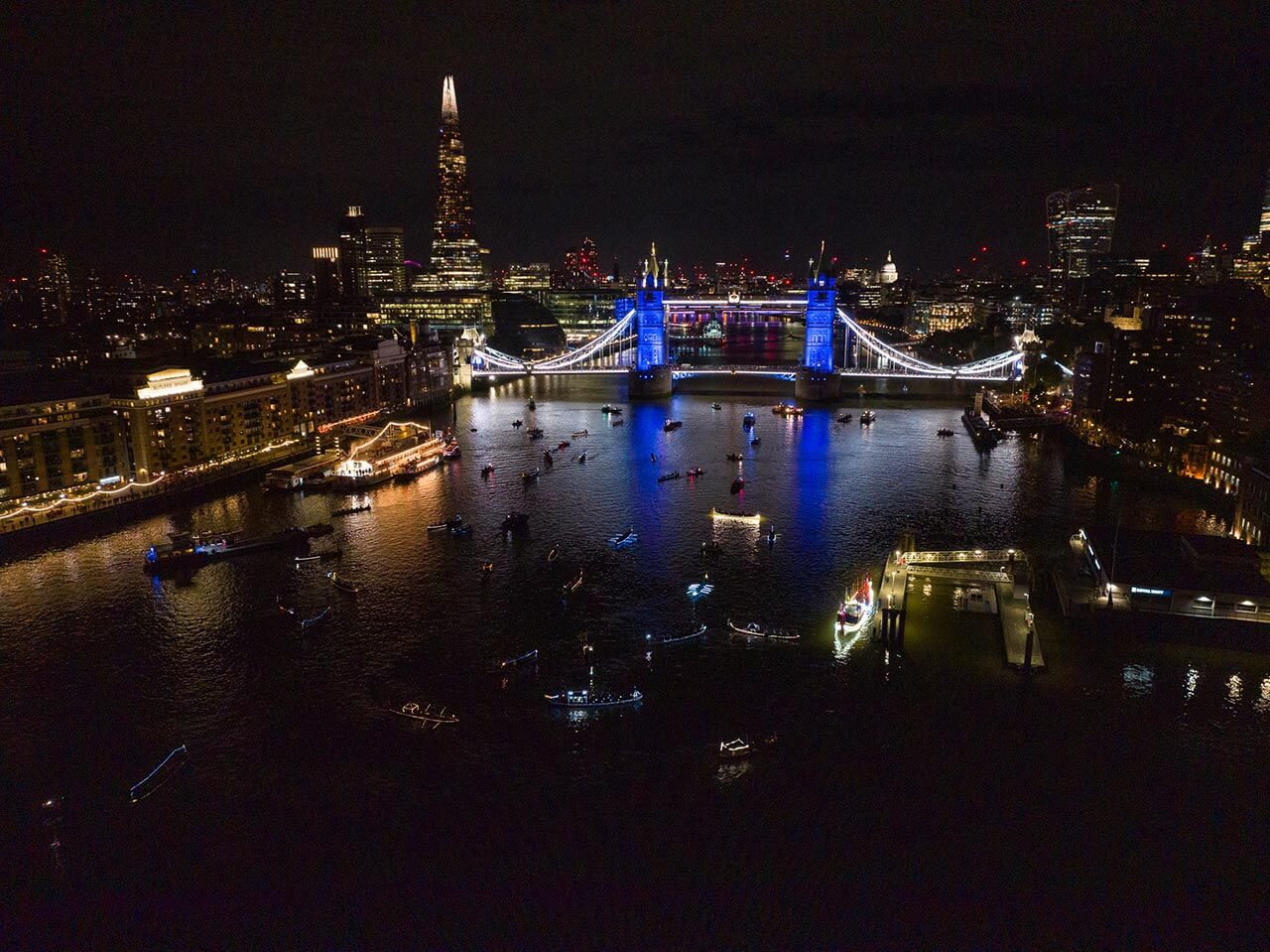 reflections flotilla river thames tower bridge